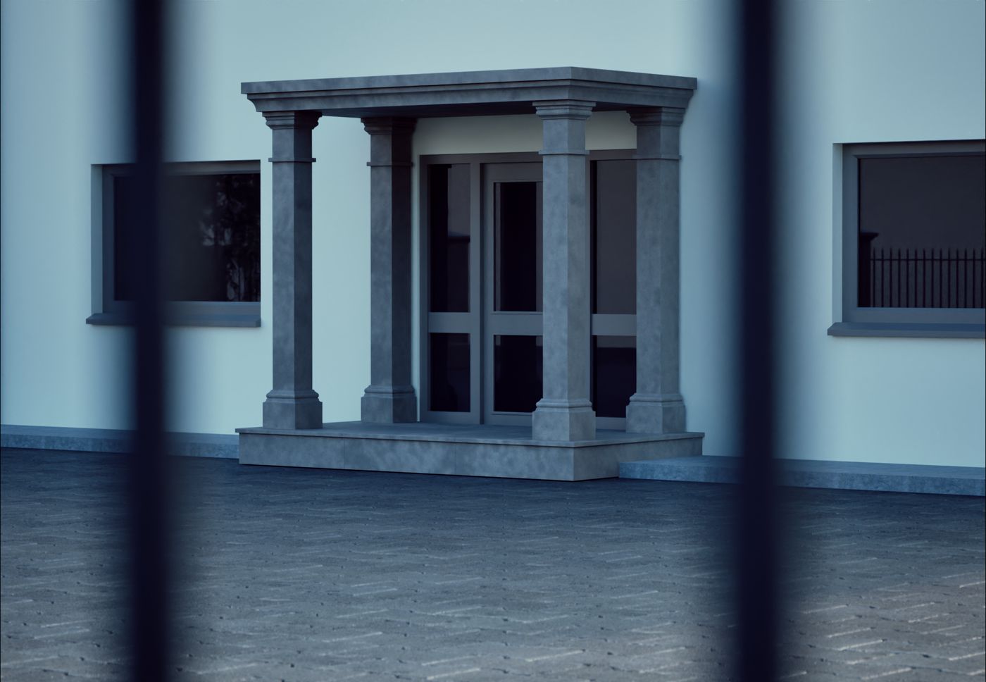 Stone portico entrance at dusk